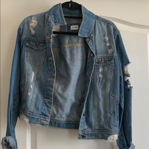 Distressed denim jacket
